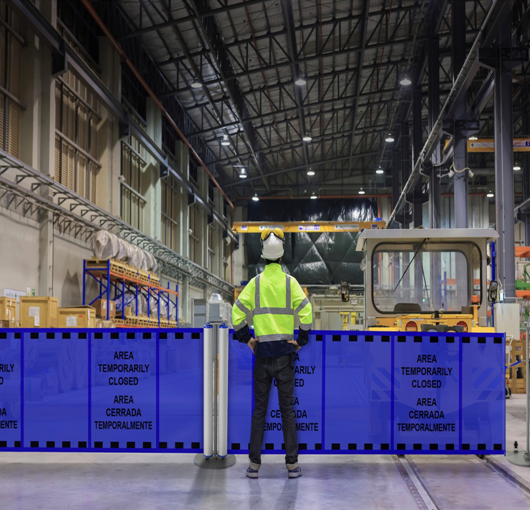 Roll-up barricade with personalized warning messages